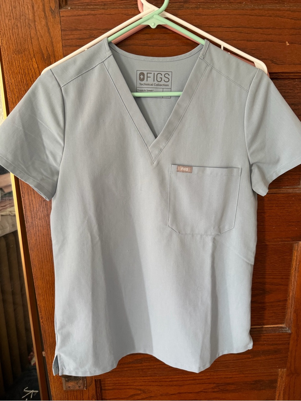 FIGS Light Blue V-Neck Scrub Top with Chest Pocket